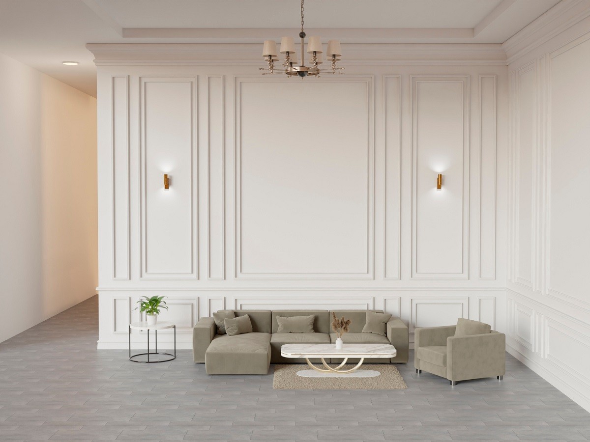 przestronny salon z białą sztukaterią styropianową i popielatą kanapą